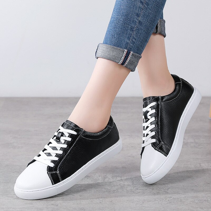 DONGNANFENG Frauen Weibliche Männer Studenten Echtem Leder Weiße Schuhe Wohnungen Lace Up Weiche Vulkanisierte Schuhe Koreanische Plus Größe 43 44 – Bild 2